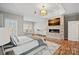 Main bedroom with a fireplace, large windows, and a view of the backyard at 888 Craigmont Nw Ln, Concord, NC 28027