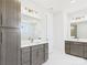 Double sink bathroom with wood cabinets, granite countertops, and modern lighting at 1010 Rolling Meadows Dr # Rm14, Mooresville, NC 28115