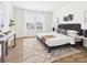 Charming bedroom with a comfortable bed, stylish decor, and a large window that fills the room with natural light at 1010 Rolling Meadows Dr # Rm14, Mooresville, NC 28115