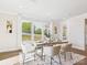 Bright dining area with large windows and stylish furnishings at 1010 Rolling Meadows Dr # Rm14, Mooresville, NC 28115