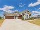 Spacious three-car garage and long driveway on a sunny day at 1010 Rolling Meadows Dr # Rm14, Mooresville, NC 28115