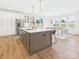 Spacious kitchen with center island, stainless steel appliances, and eat-in dining area at 1010 Rolling Meadows Dr # Rm14, Mooresville, NC 28115