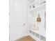 Bright mudroom with built-in storage, coat hooks, bench, and direct access from the home's entrance, great for organization at 1010 Rolling Meadows Dr # Rm14, Mooresville, NC 28115