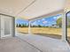 Covered patio with a nice view of the yard at 1010 Rolling Meadows Dr # Rm14, Mooresville, NC 28115