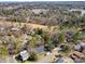 Aerial view showcasing the property's location, landscaping, and proximity to the surrounding neighborhood at 1205 Molokai Dr, Tega Cay, SC 29708