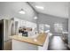 Bright kitchen with a breakfast bar, stainless steel appliances, and white cabinetry, perfect for cooking at 1205 Molokai Dr, Tega Cay, SC 29708
