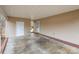 Spacious carport area with neutral walls, concrete flooring, and easy access to the house and backyard at 124 Woodside Ln, Lancaster, SC 29720