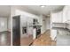 Well-equipped kitchen with stainless steel appliances, ample counter space, and stylish cabinetry at 124 Woodside Ln, Lancaster, SC 29720