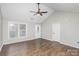 Bright, open living room with hardwood floors, lots of natural light and vaulted ceiling at 124 Woodside Ln, Lancaster, SC 29720
