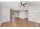 Inviting living room featuring hardwood floors and a modern ceiling fan at 124 Woodside Ln, Lancaster, SC 29720