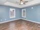 Comfortable main bedroom with natural light and a ceiling fan at 124 Woodside Ln, Lancaster, SC 29720