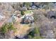 Aerial view of a single-Gathering home with expansive backyard and multi-level wooden deck at 126 Emerald Dr, Mooresville, NC 28117