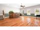 Finished basement area with wood bar, flooring, and natural light at 126 Emerald Dr, Mooresville, NC 28117