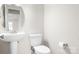Small half bathroom with pedestal sink and toilet at 126 Emerald Dr, Mooresville, NC 28117