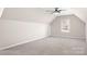 Spacious bedroom with neutral walls, carpet, and a bright window at 126 Emerald Dr, Mooresville, NC 28117