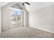 Bedroom with large arched window and vaulted ceiling at 126 Emerald Dr, Mooresville, NC 28117