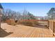 Large wooden deck offers picturesque views of the surrounding landscape at 126 Emerald Dr, Mooresville, NC 28117