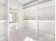 Large walk-in closet with built-in shelves and connecting bathroom at 126 Emerald Dr, Mooresville, NC 28117