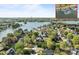 Aerial view of a lakeside community with private boat docks along the shore at 150 Harbor Cove Ln, Mooresville, NC 28117