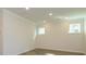 Bright bedroom featuring hardwood floors, ample natural light, and neutral paint at 17025 Malone Ln, Mint Hill, NC 28227
