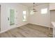 Cozy dining area with lots of windows and access to the backyard at 17025 Malone Ln, Mint Hill, NC 28227