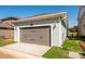 Detached two car garage with fresh paint and landscaping at 17025 Malone Ln, Mint Hill, NC 28227