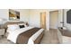 Well-appointed main bedroom with a stylish bed and a glimpse of the walk-in closet at 17025 Malone Ln, Mint Hill, NC 28227