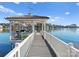 Picturesque dock featuring a gazebo, seating, and direct access to the lake at 18432 Harbor Light Blvd, Cornelius, NC 28031