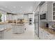 Open concept kitchen with granite countertops and stainless steel appliances at 18432 Harbor Light Blvd, Cornelius, NC 28031