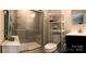 Bathroom featuring walk-in shower, vanity, mirror, toilet and shelving unit at 247 Damask Dr, Lancaster, SC 29720