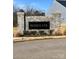 Stone Rosegate community entrance sign, enhancing curb appeal and highlighting the neighborhood's name at 247 Damask Dr, Lancaster, SC 29720