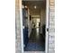 Inviting foyer featuring a blue door, wood floors, and stylish decor at 247 Damask Dr, Lancaster, SC 29720