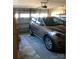Spacious two-car garage featuring an SUV and ample storage space at 247 Damask Dr, Lancaster, SC 29720