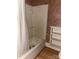 Bathroom featuring a tub with shower, white shower curtain and a small white shelving unit at 3045 Woodleaf Rd, Salisbury, NC 28147