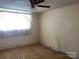 Bedroom featuring a ceiling fan and a window to allow natural light at 3045 Woodleaf Rd, Salisbury, NC 28147