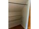 Small closet featuring a slanted ceiling with shelving and a hanging rod at 3045 Woodleaf Rd, Salisbury, NC 28147