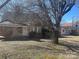 Brick home with covered front porch showcasing classic architectural details at 3045 Woodleaf Rd, Salisbury, NC 28147