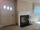 Living room with arch door and vintage fireplace at 3045 Woodleaf Rd, Salisbury, NC 28147