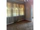 Living room with vintage curtains and chandelier at 3045 Woodleaf Rd, Salisbury, NC 28147