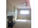 Living room featuring a classic fireplace and natural light at 3045 Woodleaf Rd, Salisbury, NC 28147