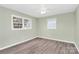 Cozy bedroom featuring new floors, fresh paint, and natural light from windows at 333 S Eastway Dr, Troutman, NC 28166