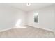 Bedroom with natural light, neutral carpet, and a single window at 341 Cline Dr, Salisbury, NC 28146