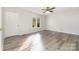 Bedroom with durable floors, ample natural light, and a ceiling fan for enhanced comfort at 341 Cline Dr, Salisbury, NC 28146