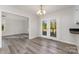 Bright dining room featuring hardwood floors and French doors to the exterior at 341 Cline Dr, Salisbury, NC 28146