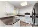 Clean kitchen with light-colored cabinets and appliances, featuring a window at 341 Cline Dr, Salisbury, NC 28146