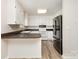 A cozy kitchen with essential appliances and light-colored cabinets at 341 Cline Dr, Salisbury, NC 28146