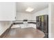Bright kitchen featuring ample counter space, white cabinets, and modern appliances at 341 Cline Dr, Salisbury, NC 28146