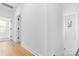 This hallway has hardwood floors and plenty of natural light from the windows at 3808 Odom Way, Charlotte, NC 28216