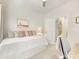 Bright bedroom with a daybed and a view of the staircase through an open door at 4010 Citra Ln, Charlotte, NC 28217