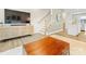 Stylish living area with decorative wooden table, adjacent to the stairs and modern decor at 4010 Citra Ln, Charlotte, NC 28217